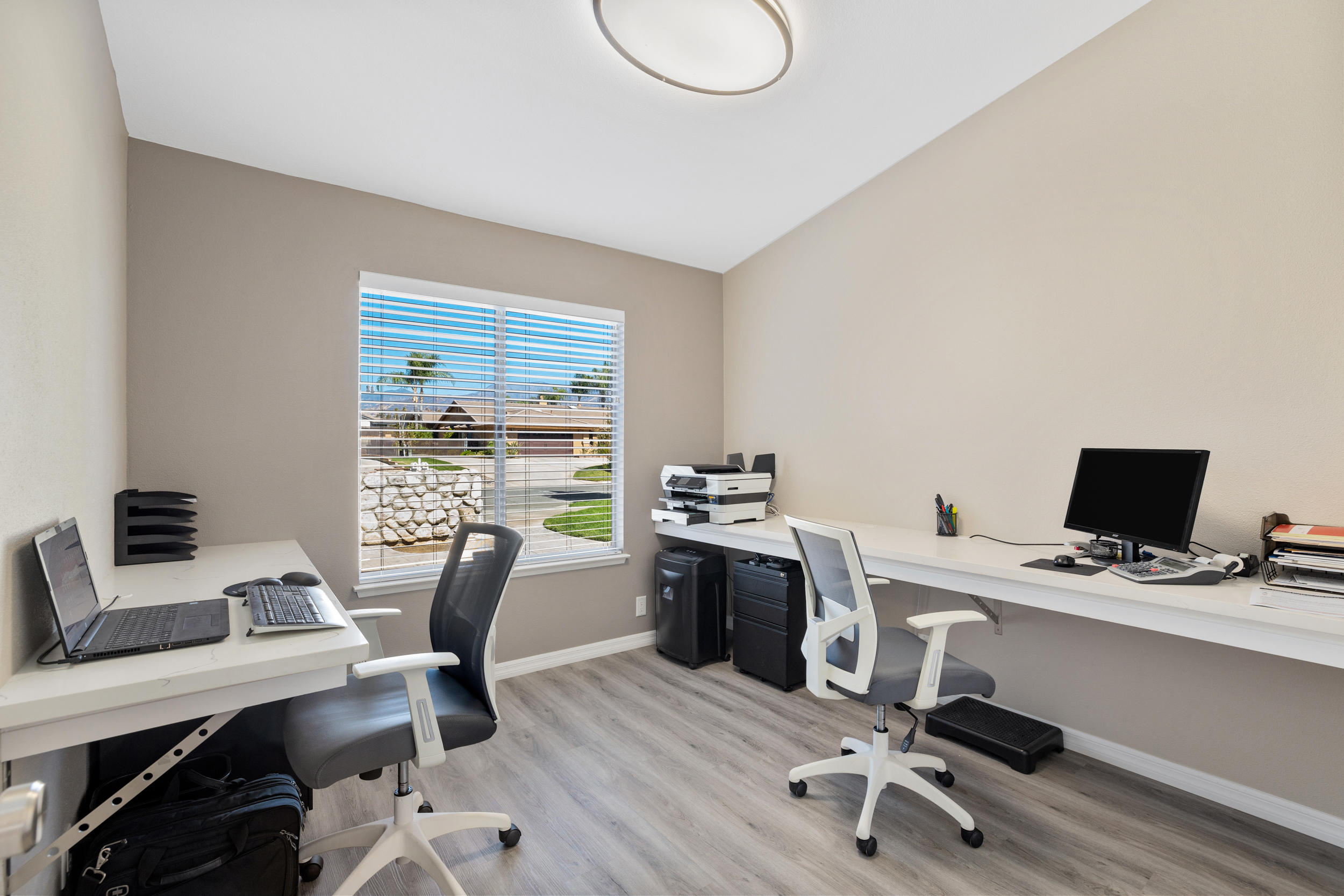 33727 Liberty Road Yucaipa, CA 92399 - Photo 20 of 39 a view of a workspace with furniture and a window