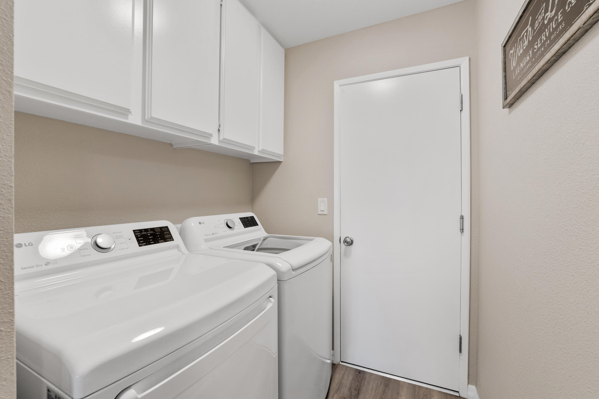 33727 Liberty Road Yucaipa, CA 92399 - Photo 22 of 39 a utility room with dryer and washer