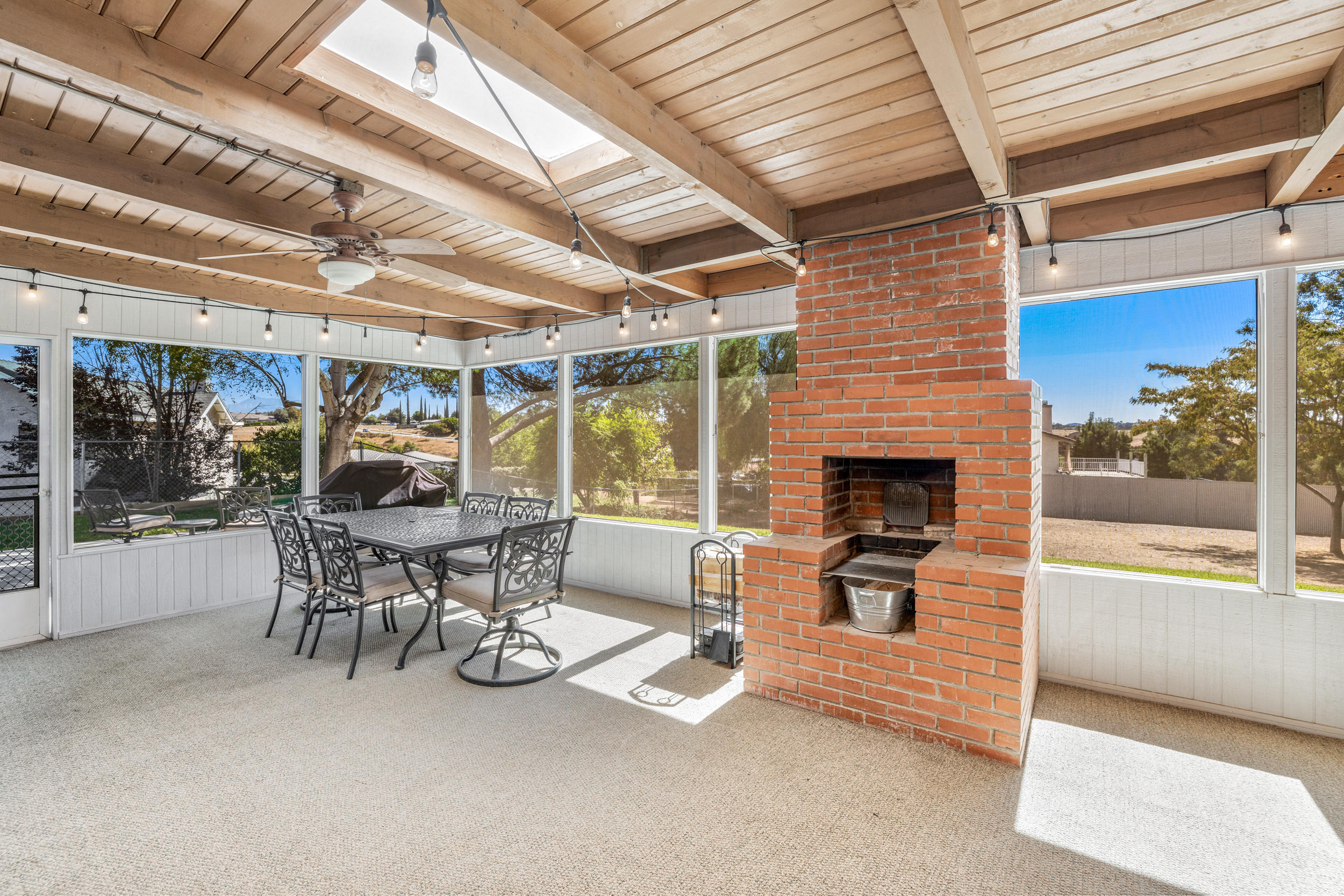 33727 Liberty Road Yucaipa, CA 92399 - Photo 24 of 39 a view of a patio with a table and chairs