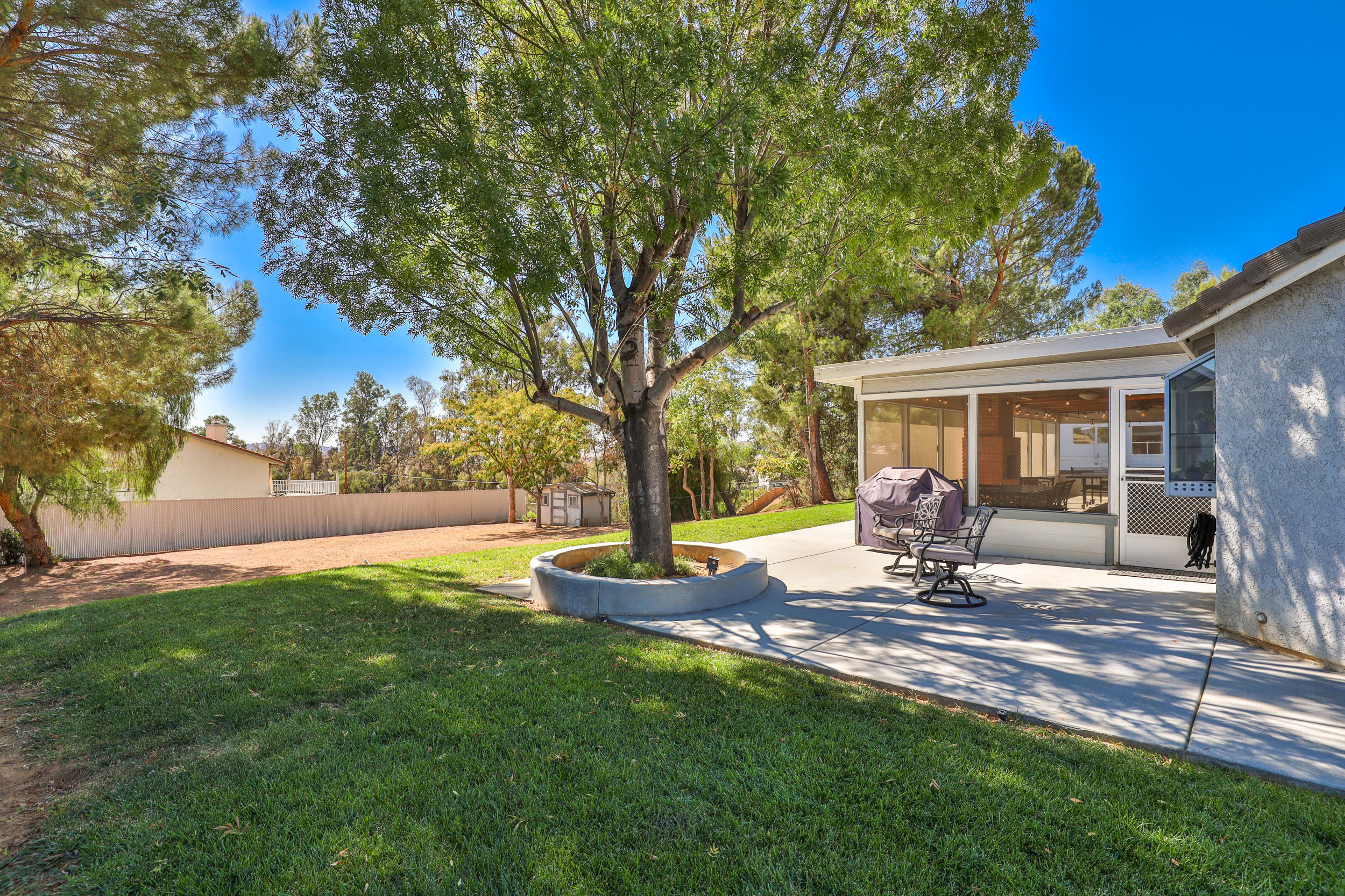 33727 Liberty Road Yucaipa, CA 92399 - Photo 27 of 39 a view of a house with backyard and sitting area