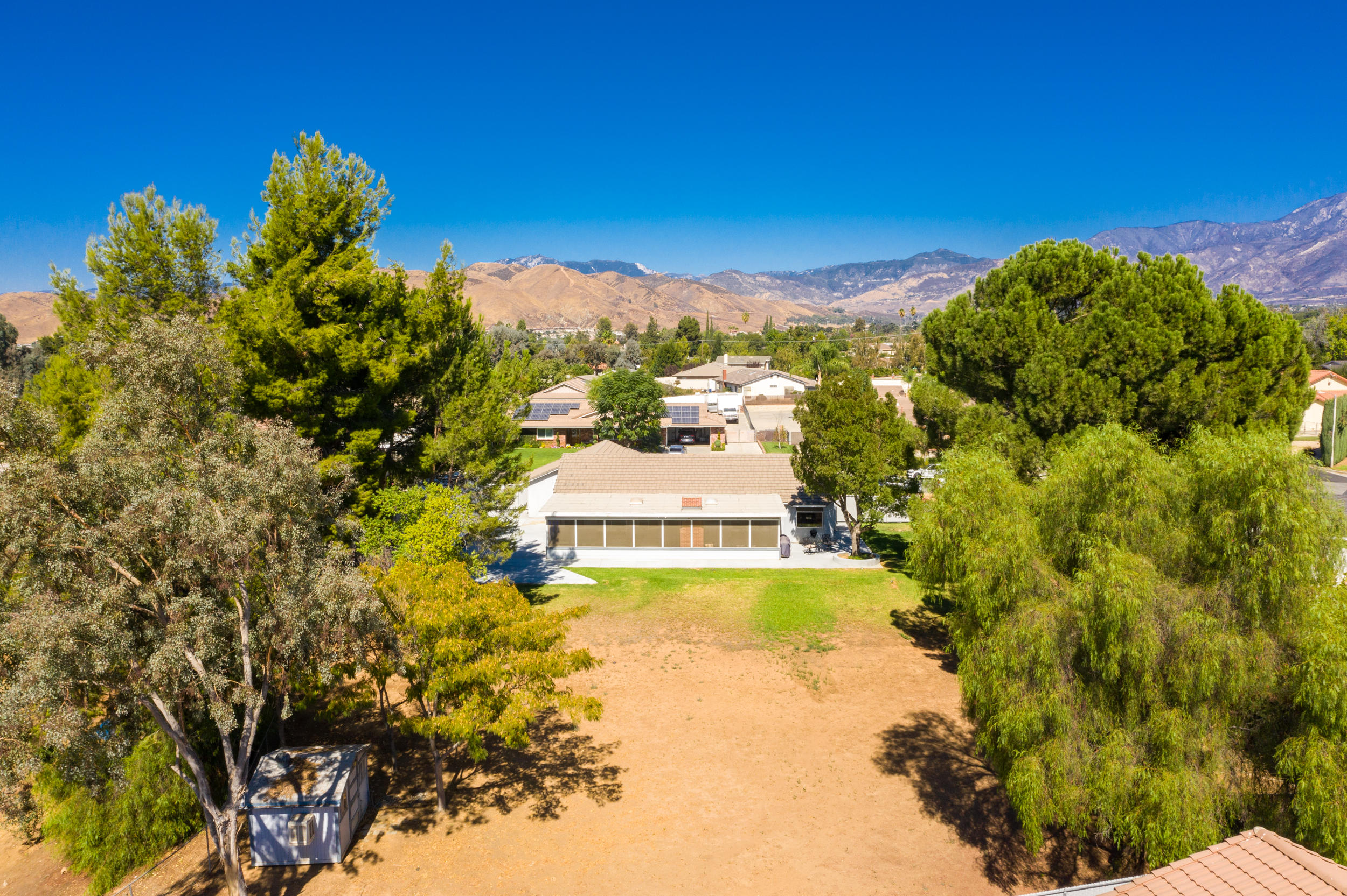 33727 Liberty Road Yucaipa, CA 92399 - Photo 36 of 39 a view of a swimming pool with a yard