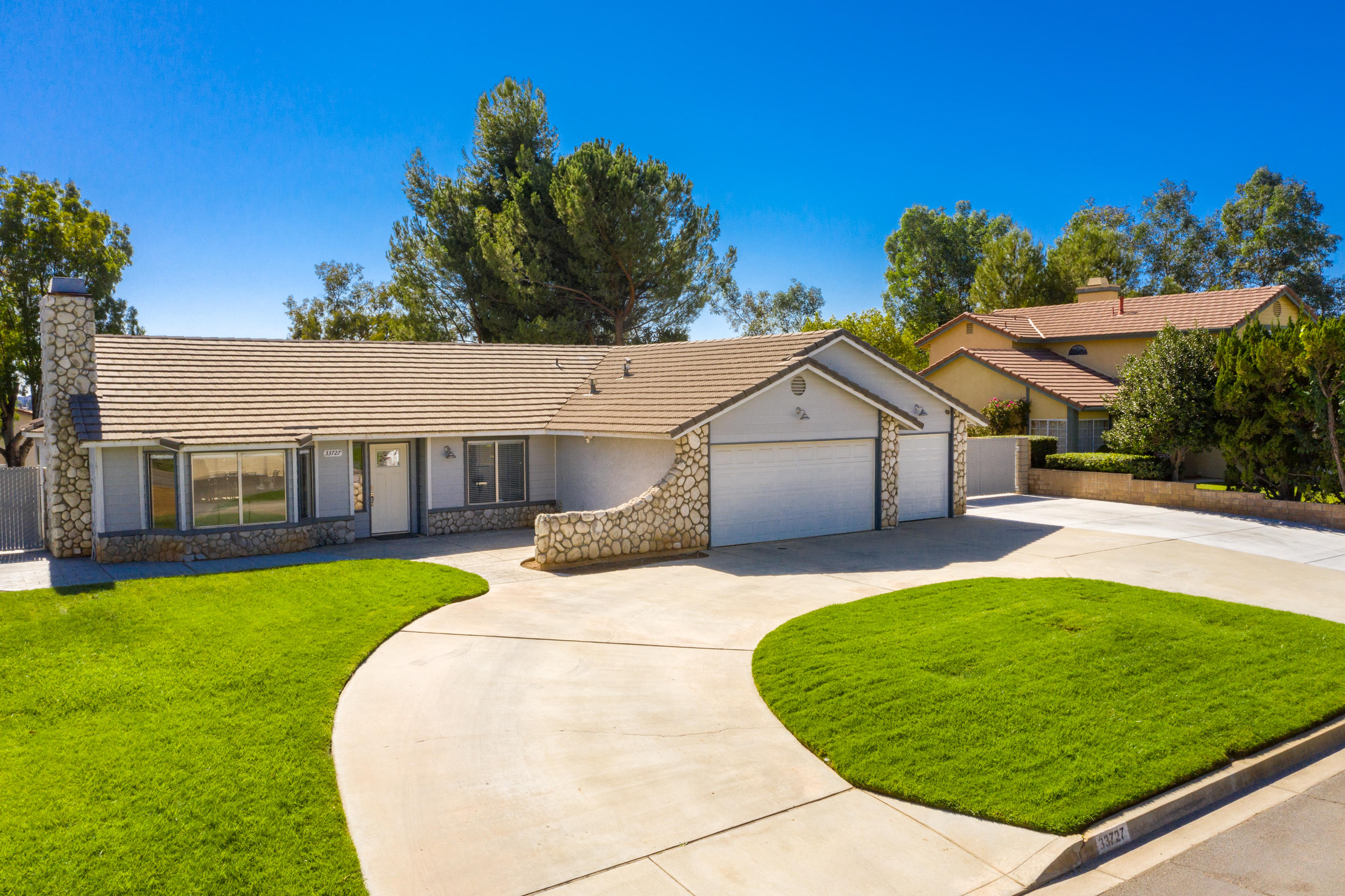 33727 Liberty Road Yucaipa, CA 92399 - Photo 38 of 39 a view of a house with a backyard