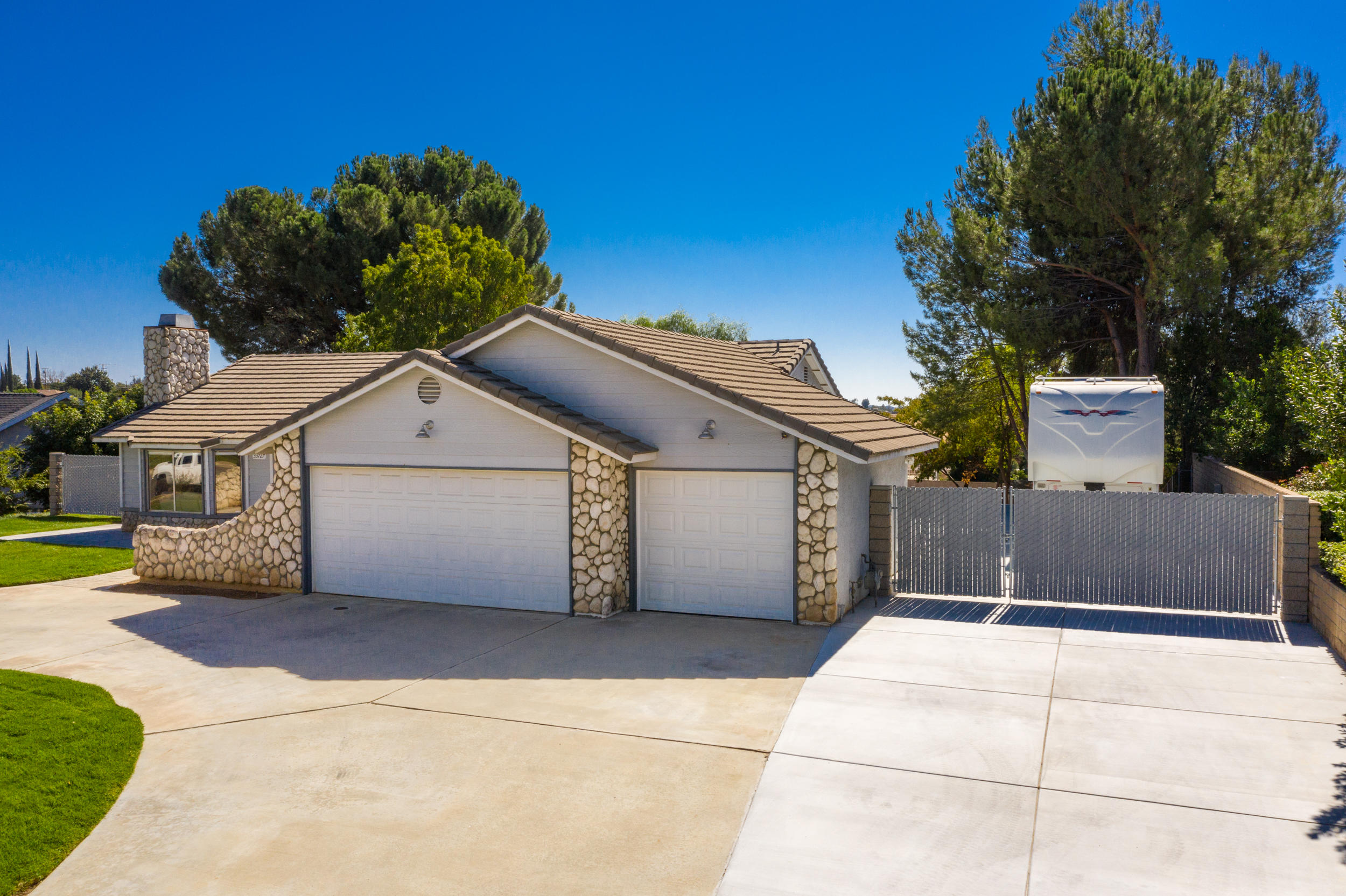33727 Liberty Road Yucaipa, CA 92399 - Photo 39 of 39 a front view of a house with a garage