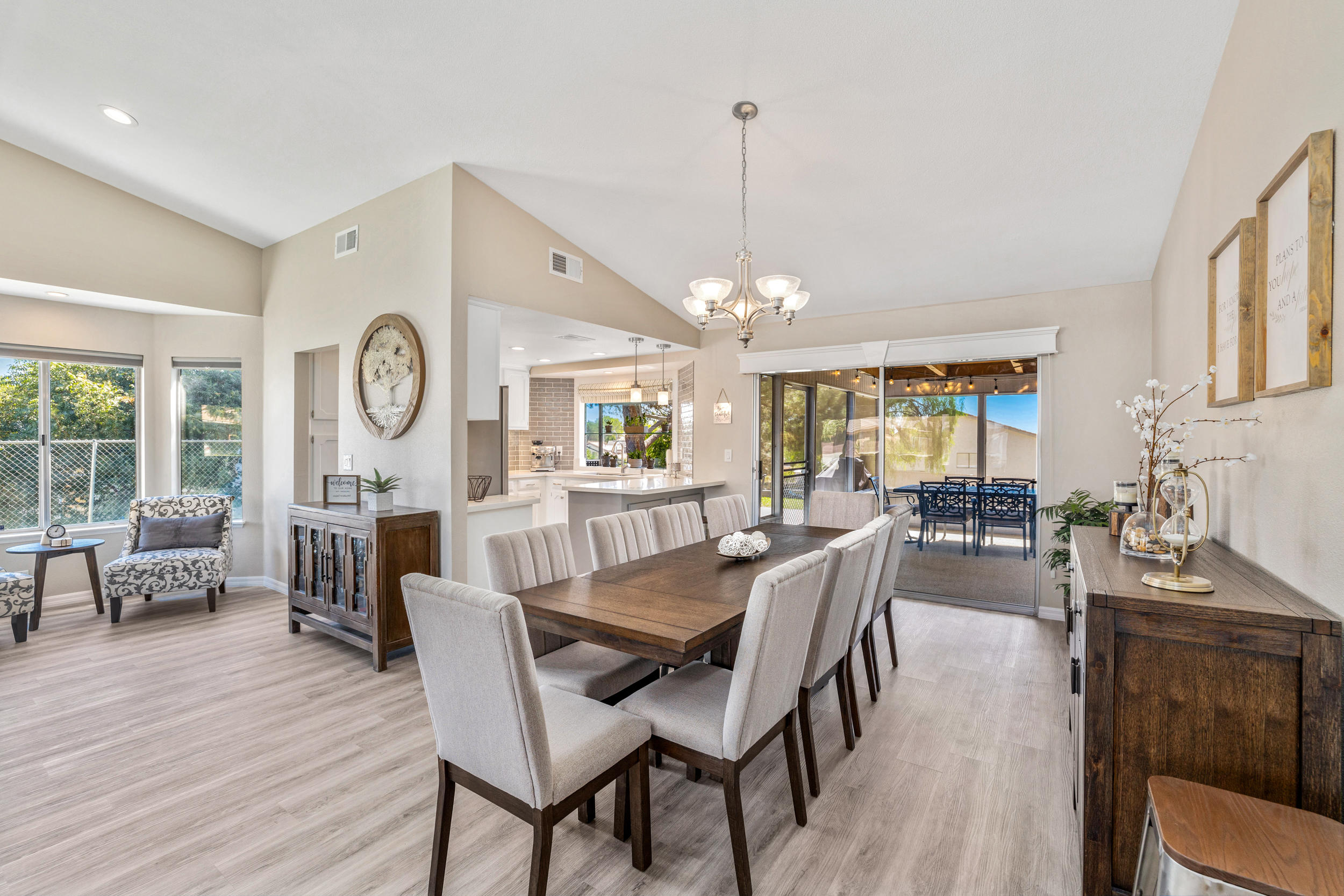 33727 Liberty Road Yucaipa, CA 92399 - Photo 6 of 39 a view of a dining room with furniture window and wooden floor