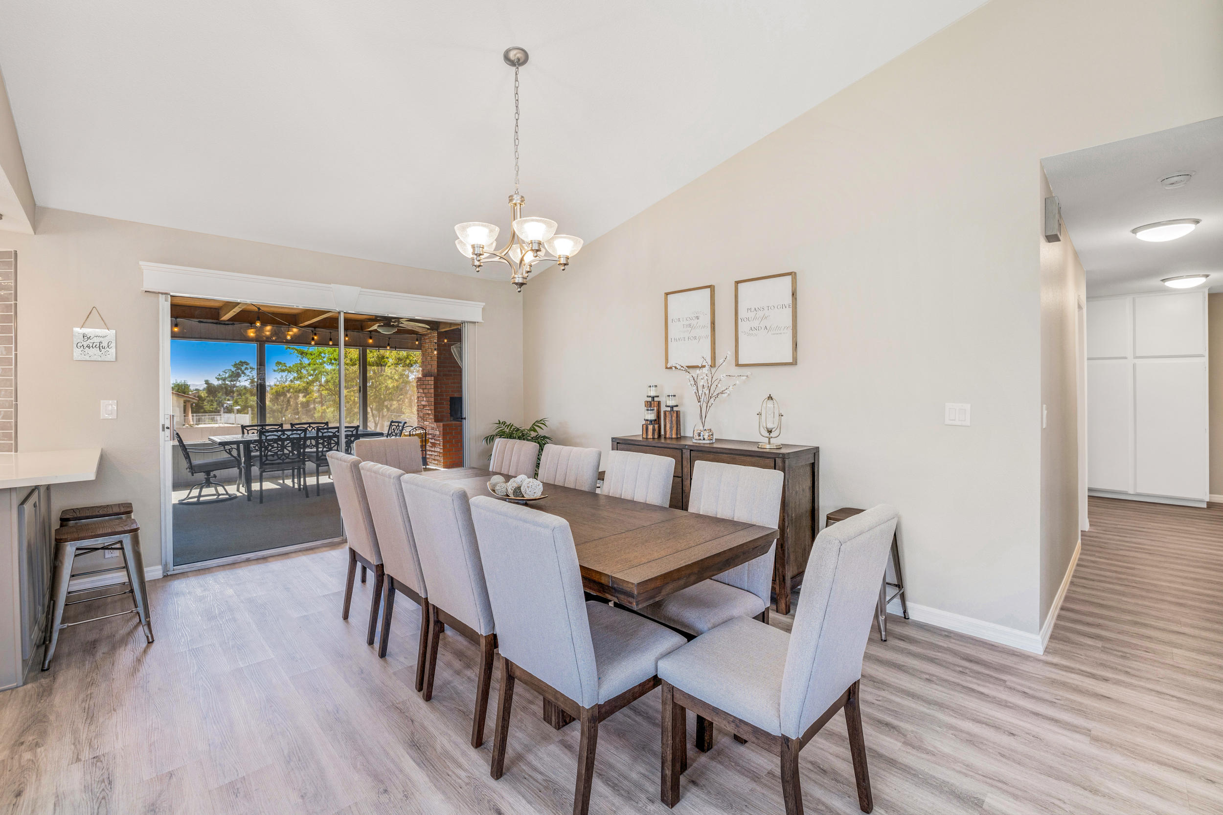 33727 Liberty Road Yucaipa, CA 92399 - Photo 7 of 39 a view of a dining room with furniture window and wooden floor