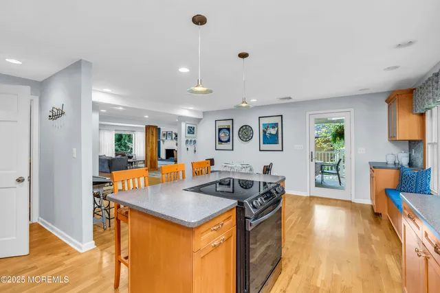 a front view of a house with a yard and a garage