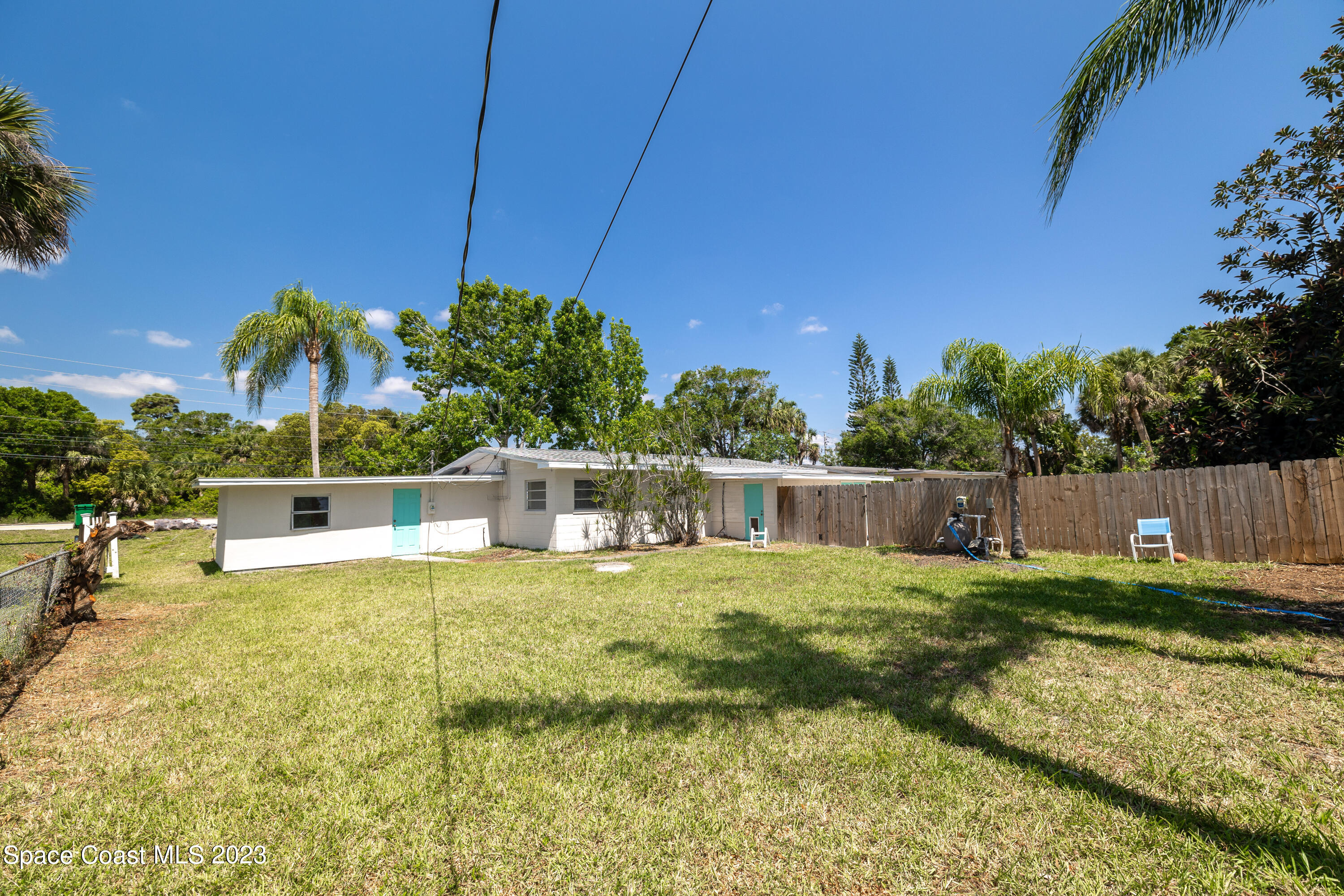 2411 Dairy Road Melbourne, FL 32901 - Photo 23 of 25 a view of a house with swimming pool