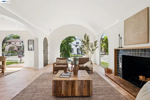 a kitchen with stainless steel appliances a stove a sink and cabinets