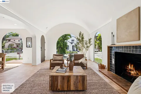 a kitchen with stainless steel appliances kitchen island granite countertop a stove a sink and white cabinets