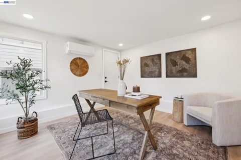 a bathroom with a sink vanity toilet and shower