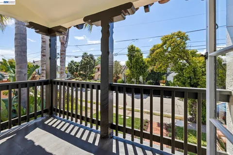 a living room with furniture fireplace and a table