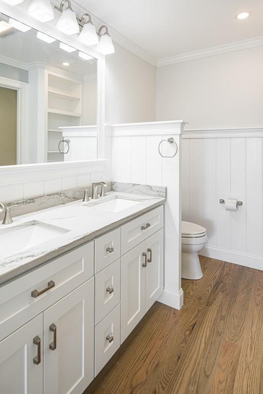 52 Elmore Road Hingham, MA 02043 - Photo 29 of 39 a spacious bathroom with a granite countertop sink a toilet and a mirror