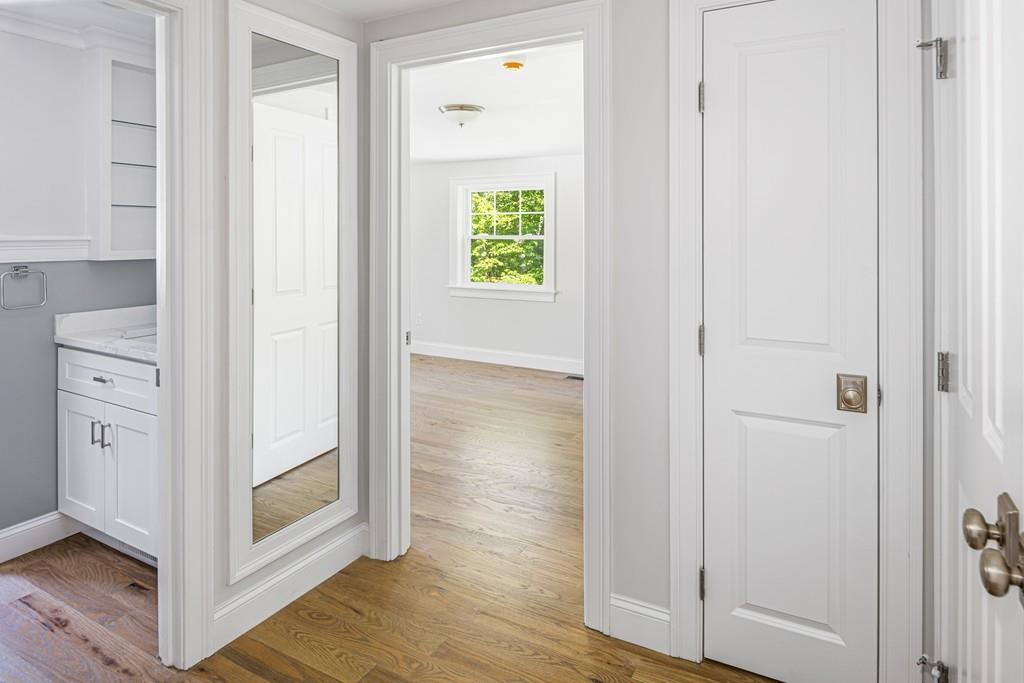 52 Elmore Road Hingham, MA 02043 - Photo 37 of 39 a view of an entryway with wooden floor