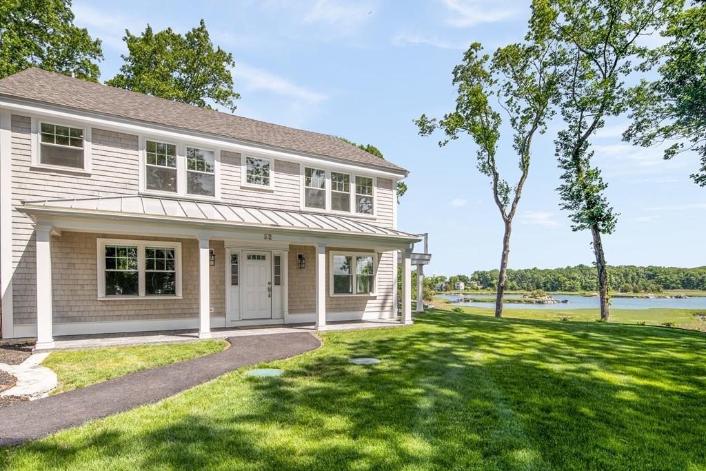 52 Elmore Road Hingham, MA 02043 - Photo 4 of 39 front view of a house with a yard