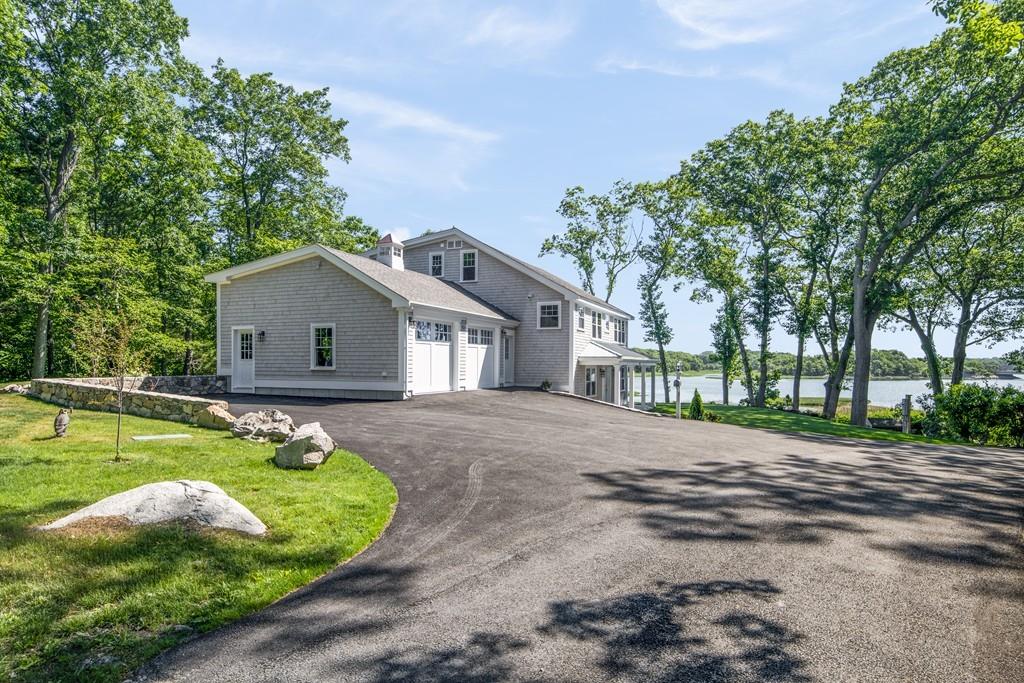 52 Elmore Road Hingham, MA 02043 - Photo 5 of 39 a view of a house with swimming pool and a yard