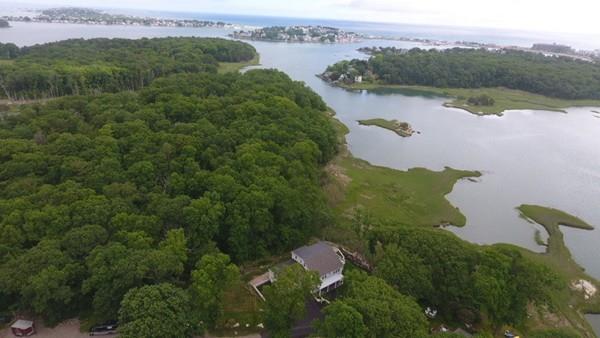 52 Elmore Road Hingham, MA 02043 - Photo 6 of 39 an aerial view of lake with residential houses with outdoor space and swimming pool