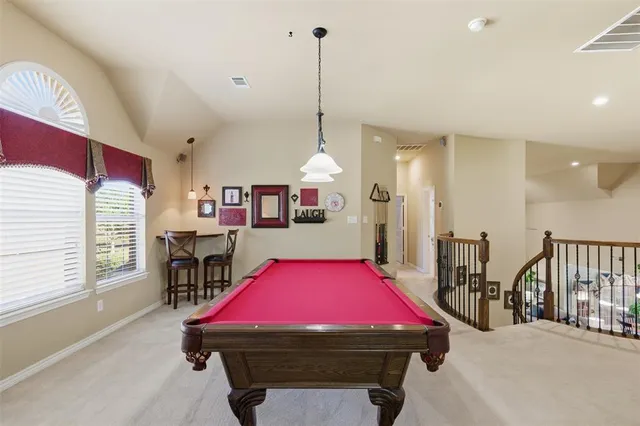 a room with lots of furniture and windows