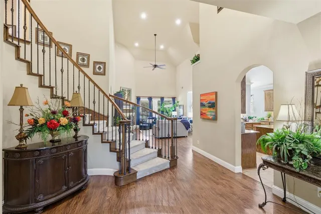 a view of entryway with wooden floor and a potted plant