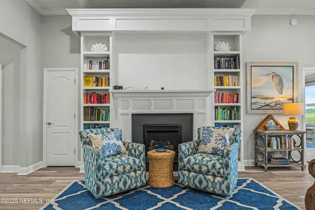 a kitchen with granite countertop white cabinets and sink