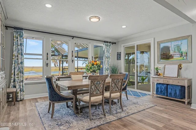 a spacious bedroom with a bed and a dresser