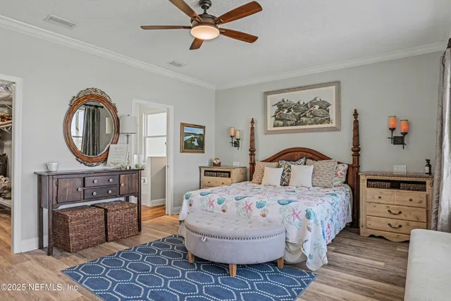 a bathroom with a granite countertop sink a toilet and a mirror