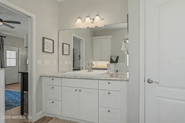 a view of a workspace with furniture