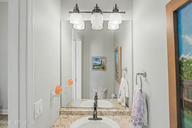 a view of a chairs and table in the patio