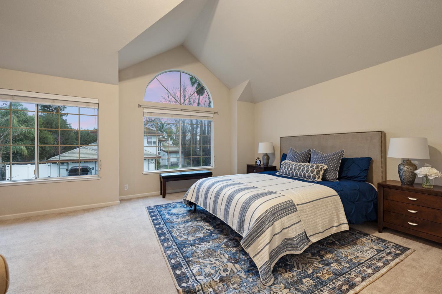 2309 O'Keeffe Pl. Davis, CA 95618 - Photo 24 of 57 a bedroom with a bed and a large window with outer view