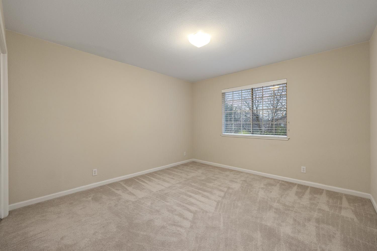 2309 O'Keeffe Pl. Davis, CA 95618 - Photo 33 of 57 an empty room with windows