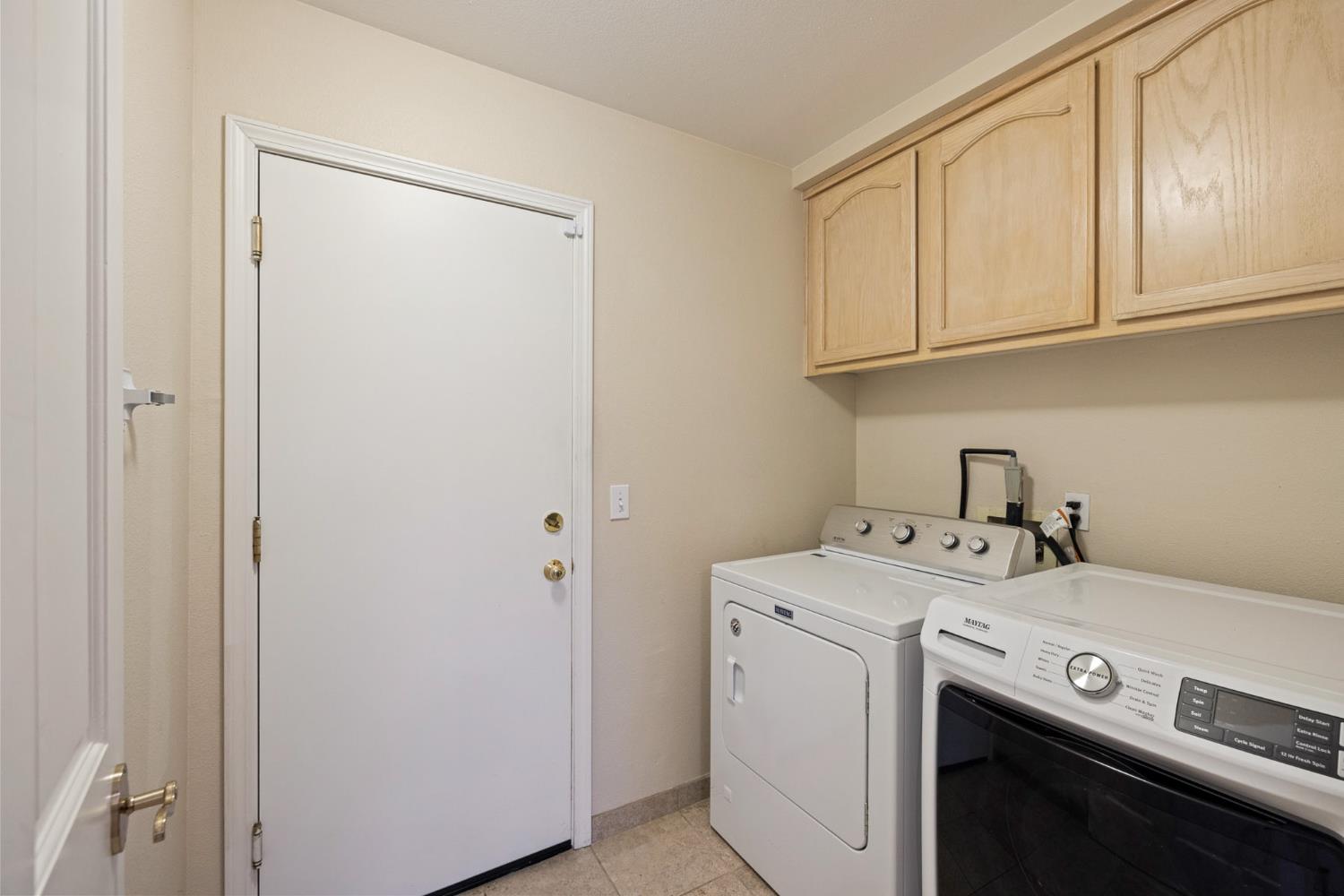 2309 O'Keeffe Pl. Davis, CA 95618 - Photo 36 of 57 a utility room with dryer and washer