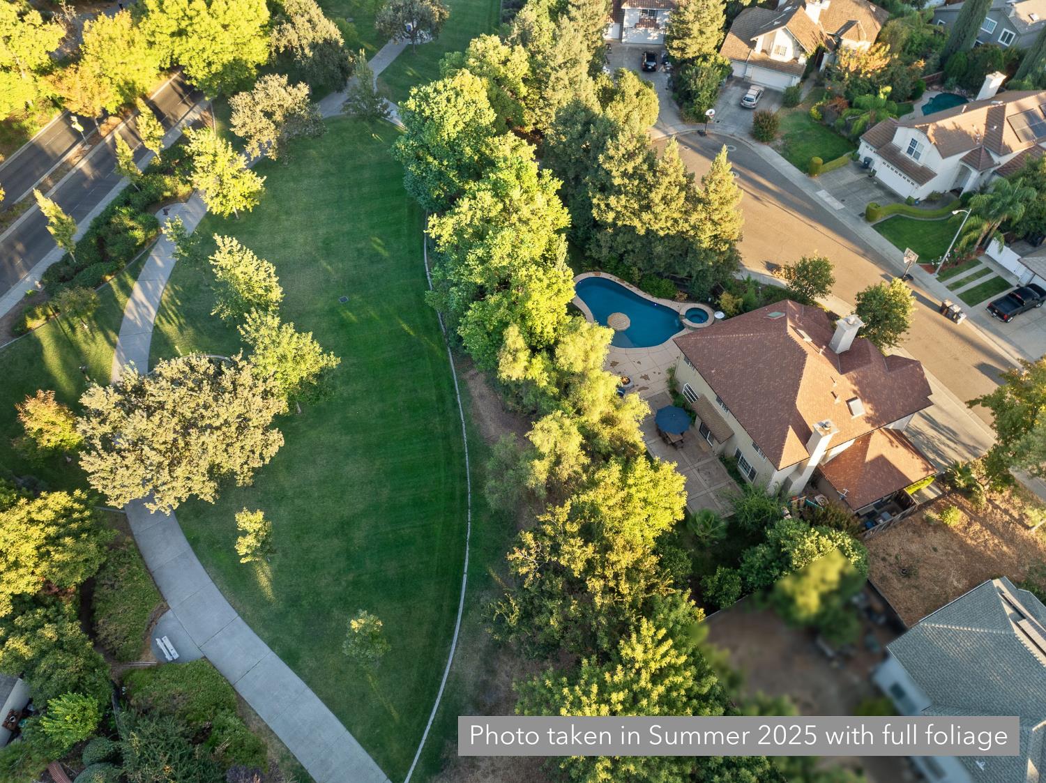 2309 O'Keeffe Pl. Davis, CA 95618 - Photo 37 of 57 an aerial view of a house with a yard