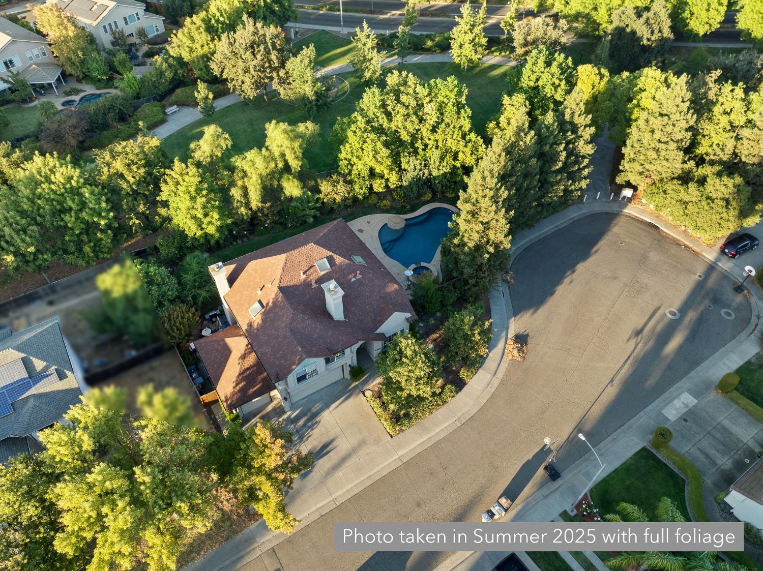 2309 O'Keeffe Pl. Davis, CA 95618 - Photo 38 of 57 an aerial view of a house with a yard and a garden