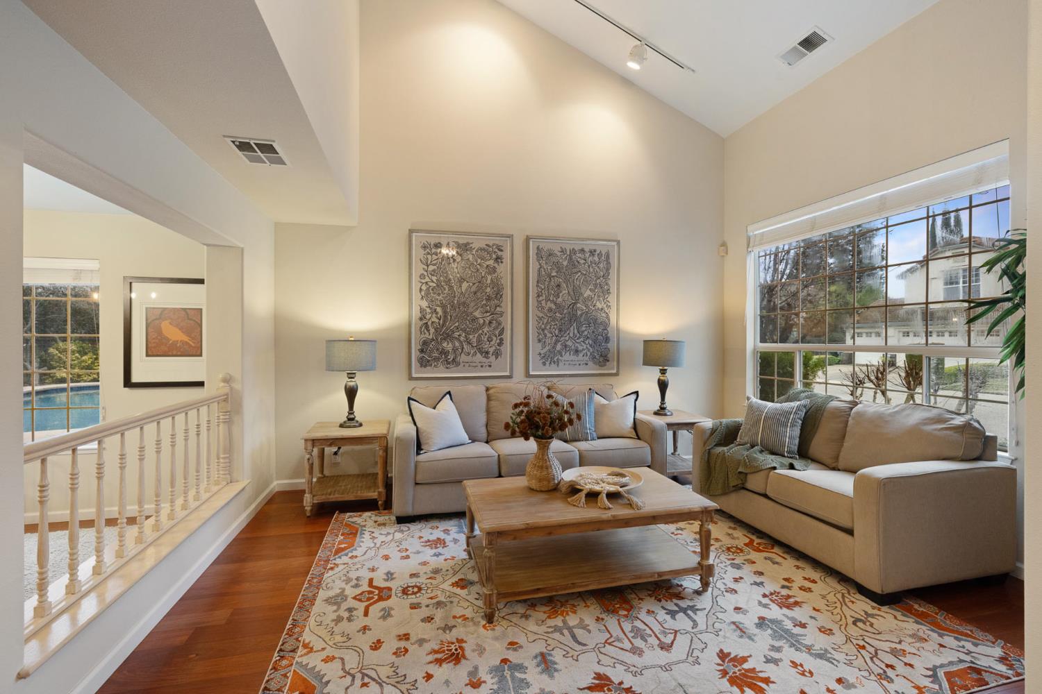 2309 O'Keeffe Pl. Davis, CA 95618 - Photo 4 of 57 a living room with furniture and a large window
