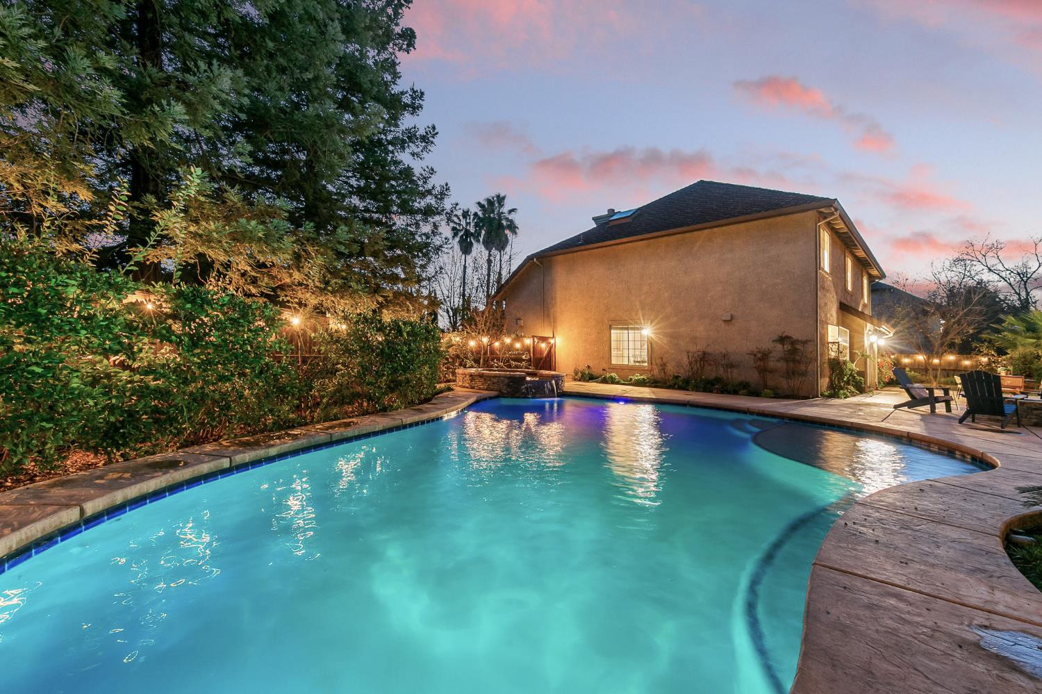2309 O'Keeffe Pl. Davis, CA 95618 - Photo 48 of 57 a view of a swimming pool with an outdoor space and seating area