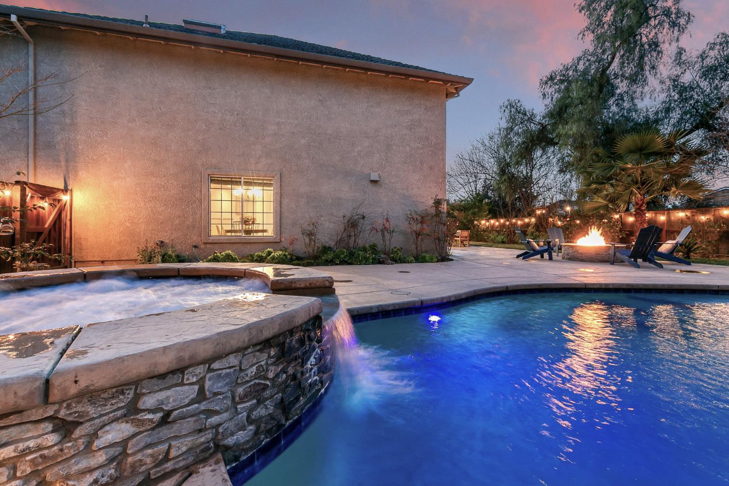 2309 O'Keeffe Pl. Davis, CA 95618 - Photo 54 of 57 a view of a house with swimming pool and sitting area