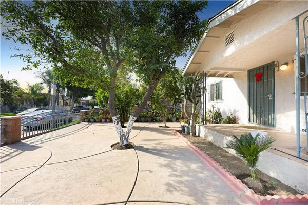 a view of a backyard with a patio