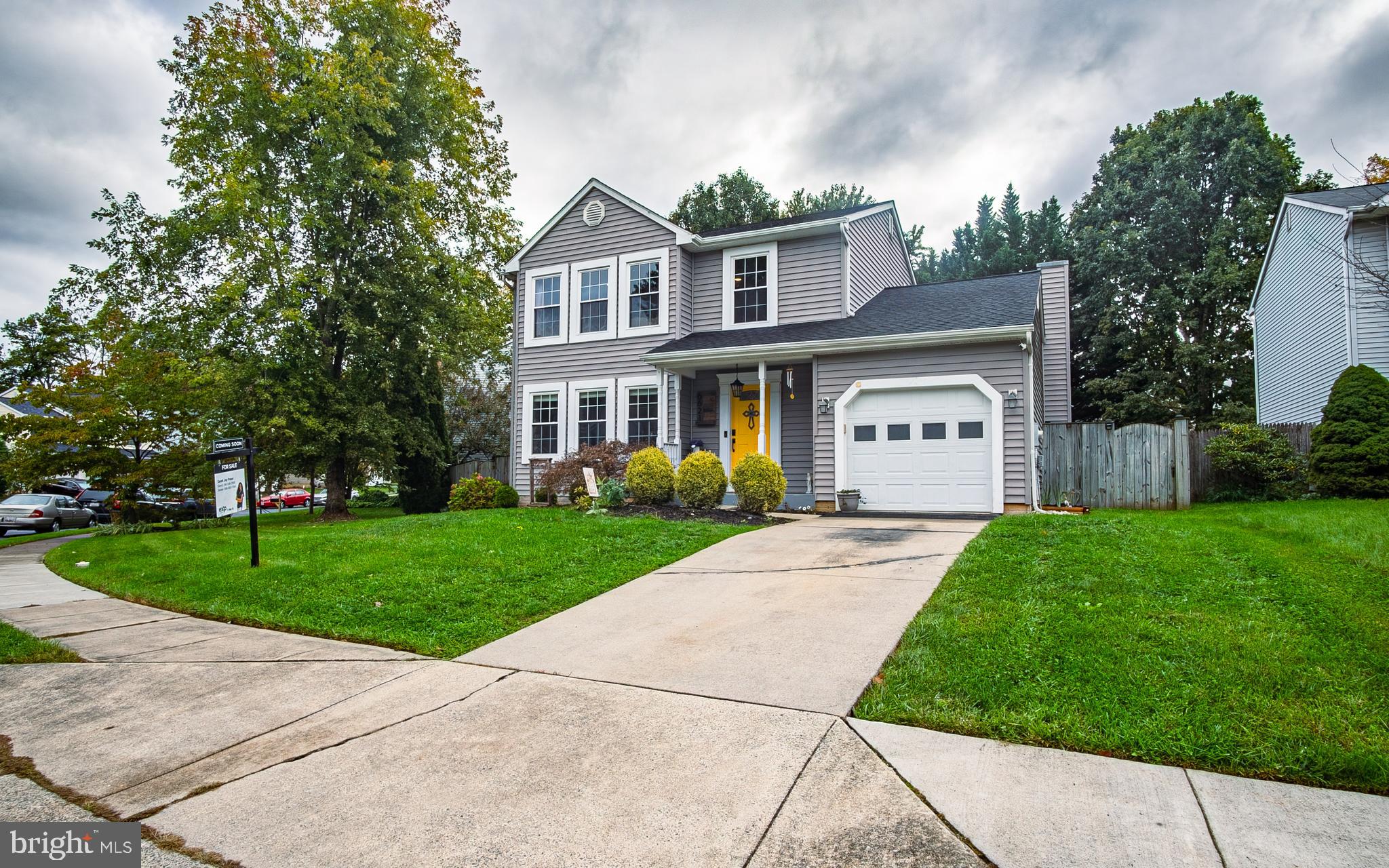 6621 Gooseander Court Frederick, MD 21703 - Photo 2 of 42 a front view of house with yard and green space