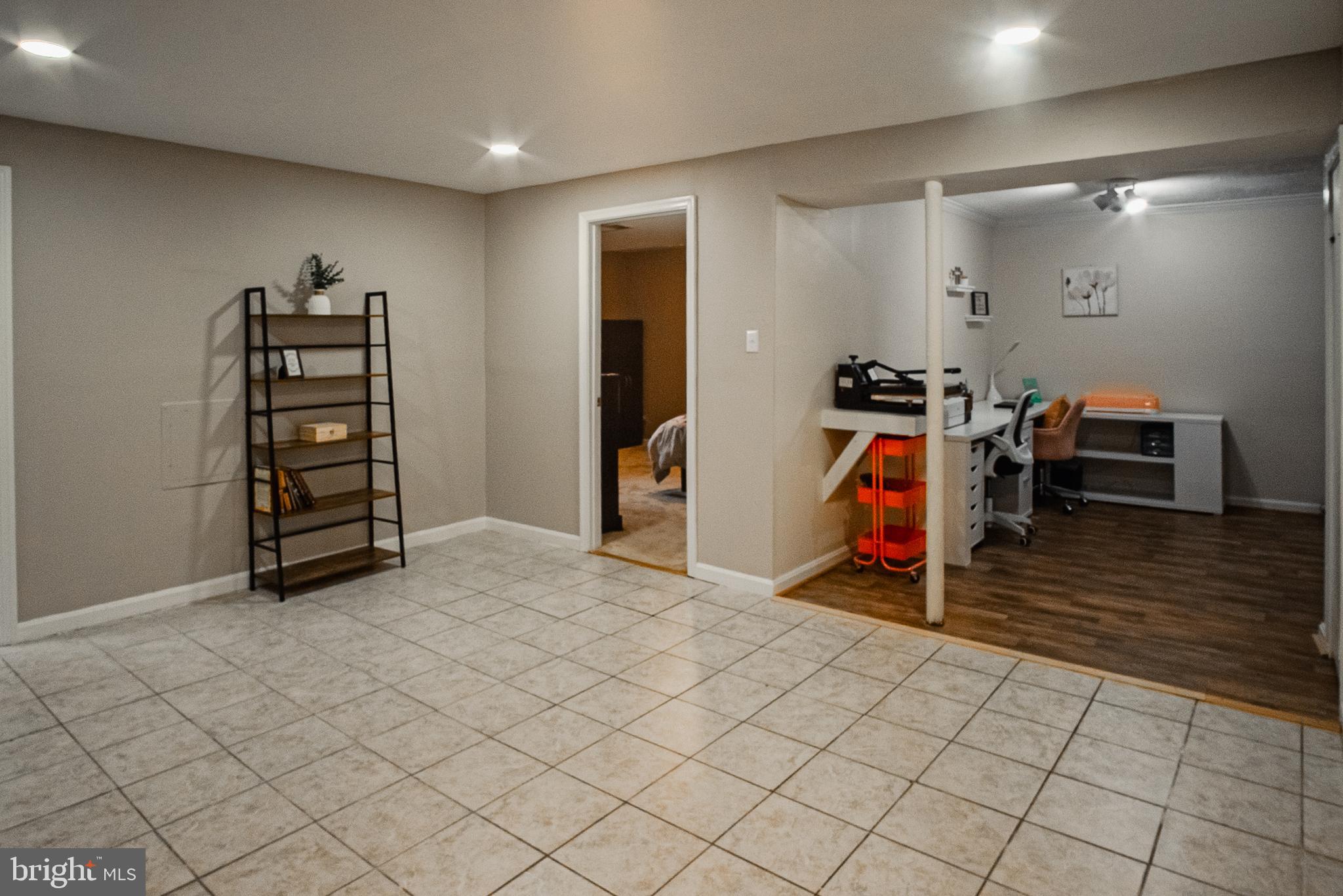 6621 Gooseander Court Frederick, MD 21703 - Photo 35 of 42 a view of a room with gym equipment