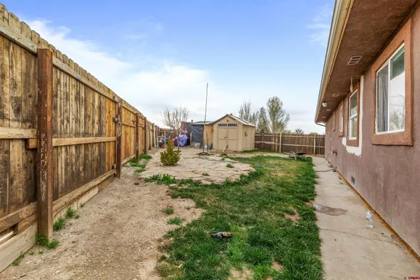 a bathroom with a sink mirror and window
