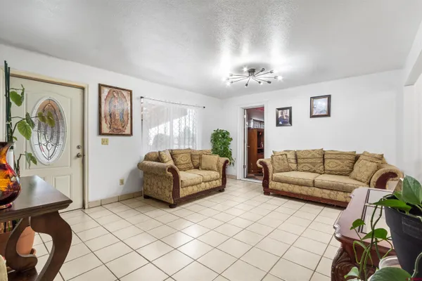 a living room with furniture and a couch
