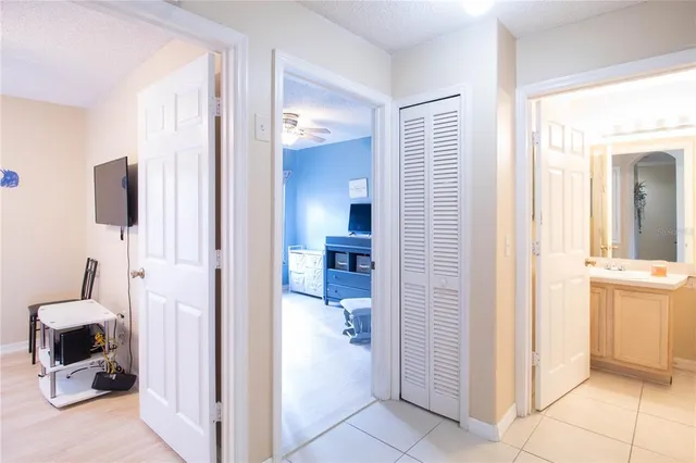a view of a livingroom with bathroom and bathroom