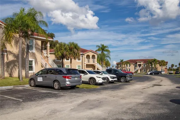 a car parked in front of a houses