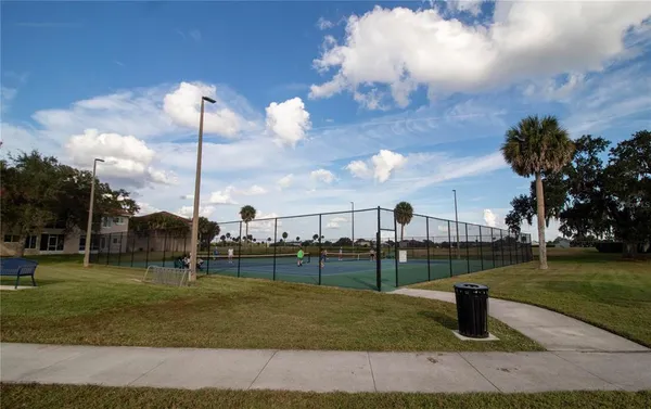 a park view with a fountain