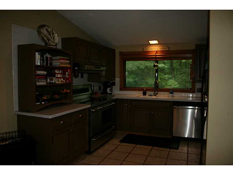 199 Yawgoo Valley Road Exeter, RI 02822 - Photo 4 of 25 Kitchen. Kitchen opens up to dining area and living room