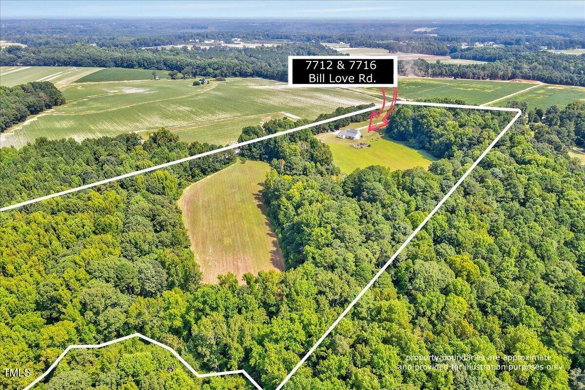 7716 Bill Love Road Willow Spring, NC 27592 - Photo 1 of 43 48-7712 Bill Love Rd-44 WCC