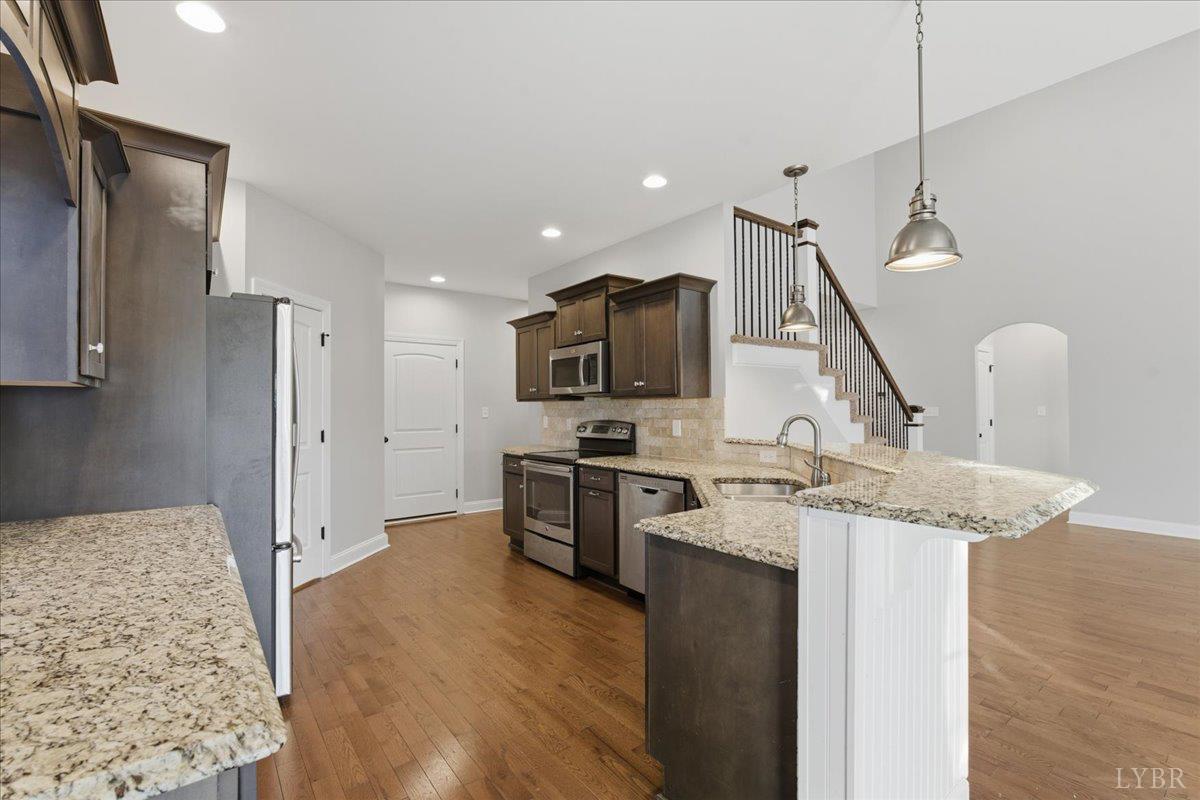 509 Cornerstone Street Lynchburg, VA 24502 - Photo 21 of 56 a kitchen with a sink appliances and cabinets