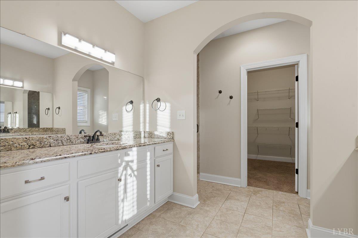 509 Cornerstone Street Lynchburg, VA 24502 - Photo 34 of 56 a bathroom with a granite countertop sink mirror and a