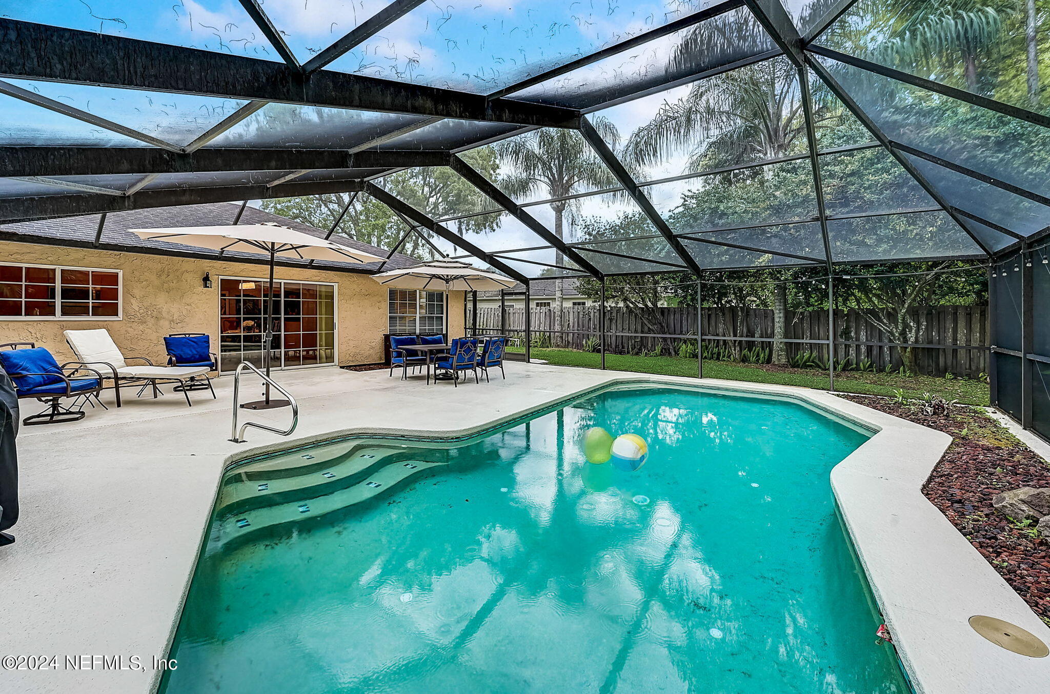 1130 Linwood Loop St. Johns, FL 32259 - Photo 2 of 34 a view of a swimming pool with a patio