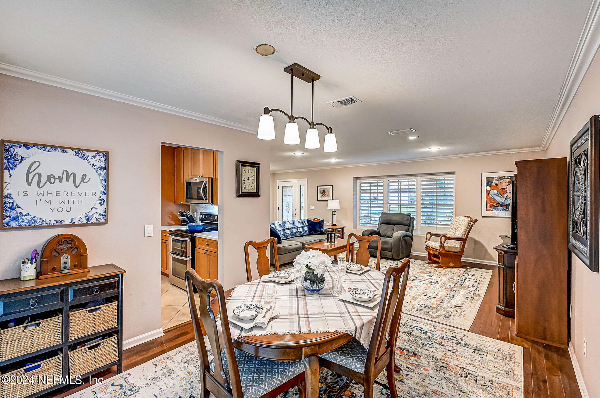 1130 Linwood Loop St. Johns, FL 32259 - Photo 23 of 34 a view of a dining room with furniture window and wooden floor
