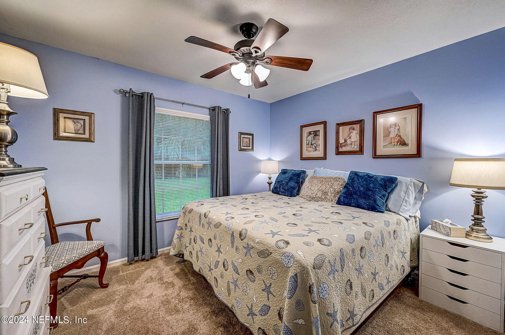 1130 Linwood Loop St. Johns, FL 32259 - Photo 24 of 34 a bed room with a bed and a chair